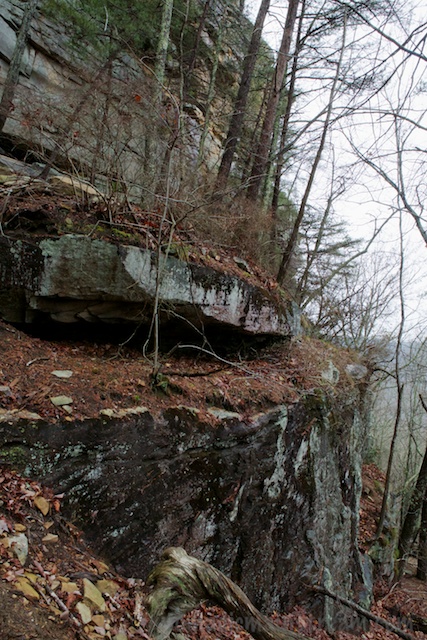 An example of a rock shelf that looks like it will slide off down the hill at any time
