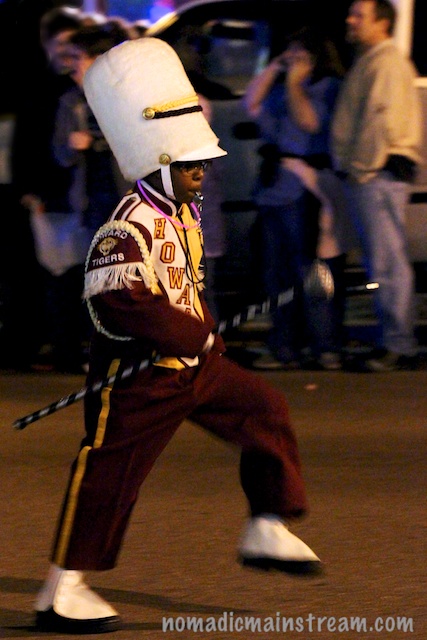 This little guy led the high school band like he was ready to graduate.