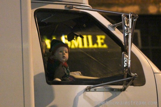 The lighted sign appeared like a thought bubble above this curious baby's head.