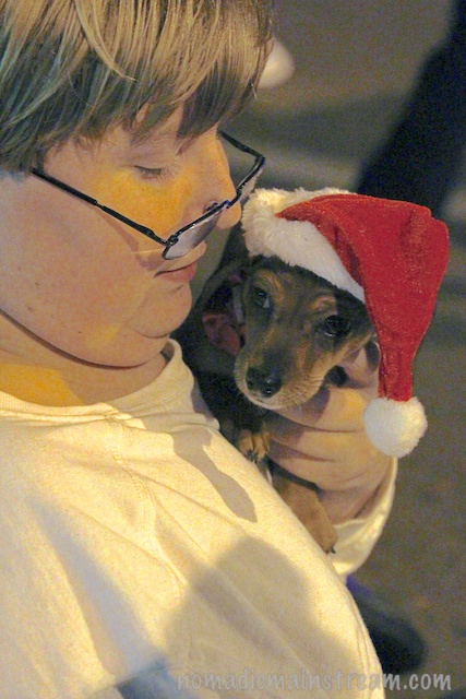The young boy sitting next to me had it own miniature santa.