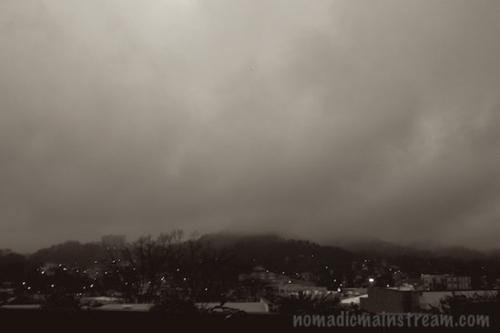 The sun is rising, but not within view--we get to see fog over the ridge