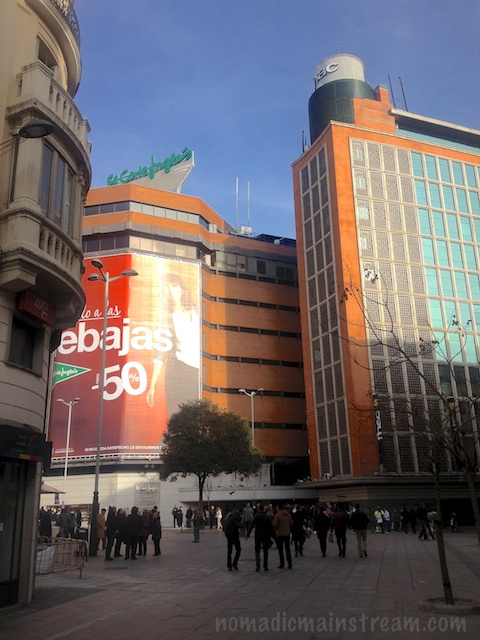 Modern sky scrapers with just a smidgen of older architecture in the foreground