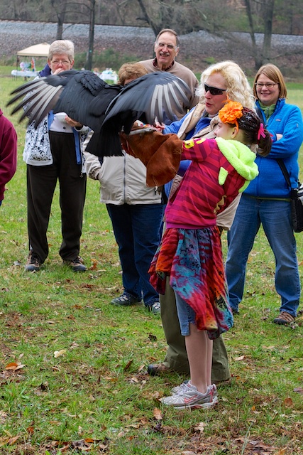 The young lady celebrated her birthday holding a vulture