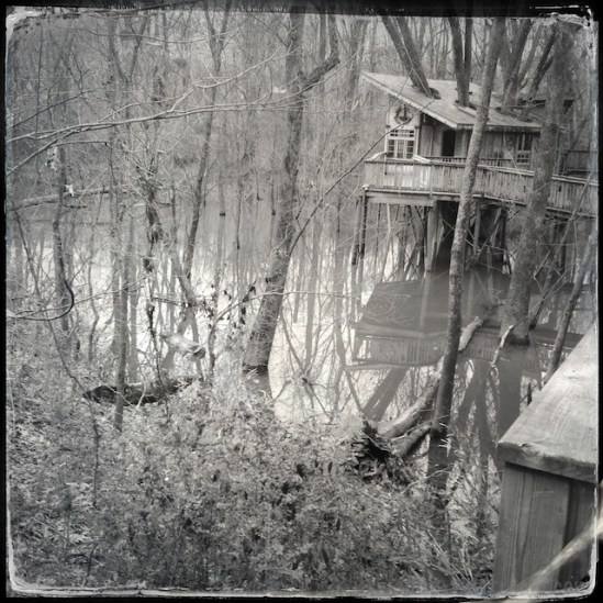 Tipping treehouse with corner of railing in the foreground doesn't work