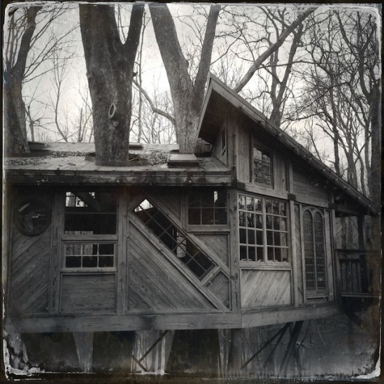 Up close look at the crazy angles of the treehouse--love the diagonal window