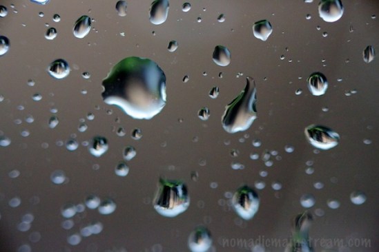 Drops reflecting the buildings outside