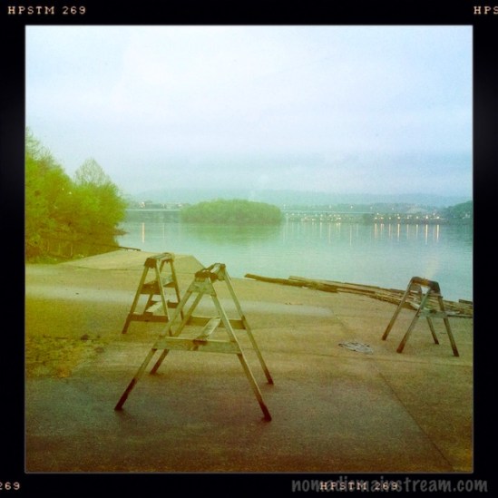 Looking across the rests used for sculling boats to McClellan Island