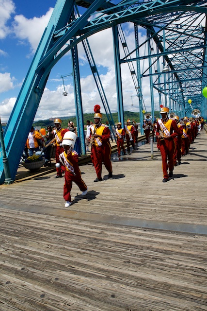 The 8-year old drum major led the band down the bridge