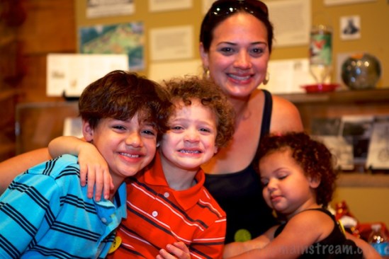 The winner with the most observed birds in the elementary age group celebrated with his family